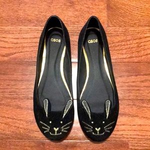 Gold and black velvet bunny flats.